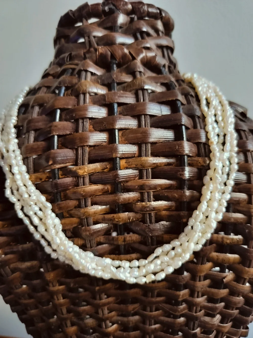 Elegant multi-strand freshwater rice pearl necklace with a